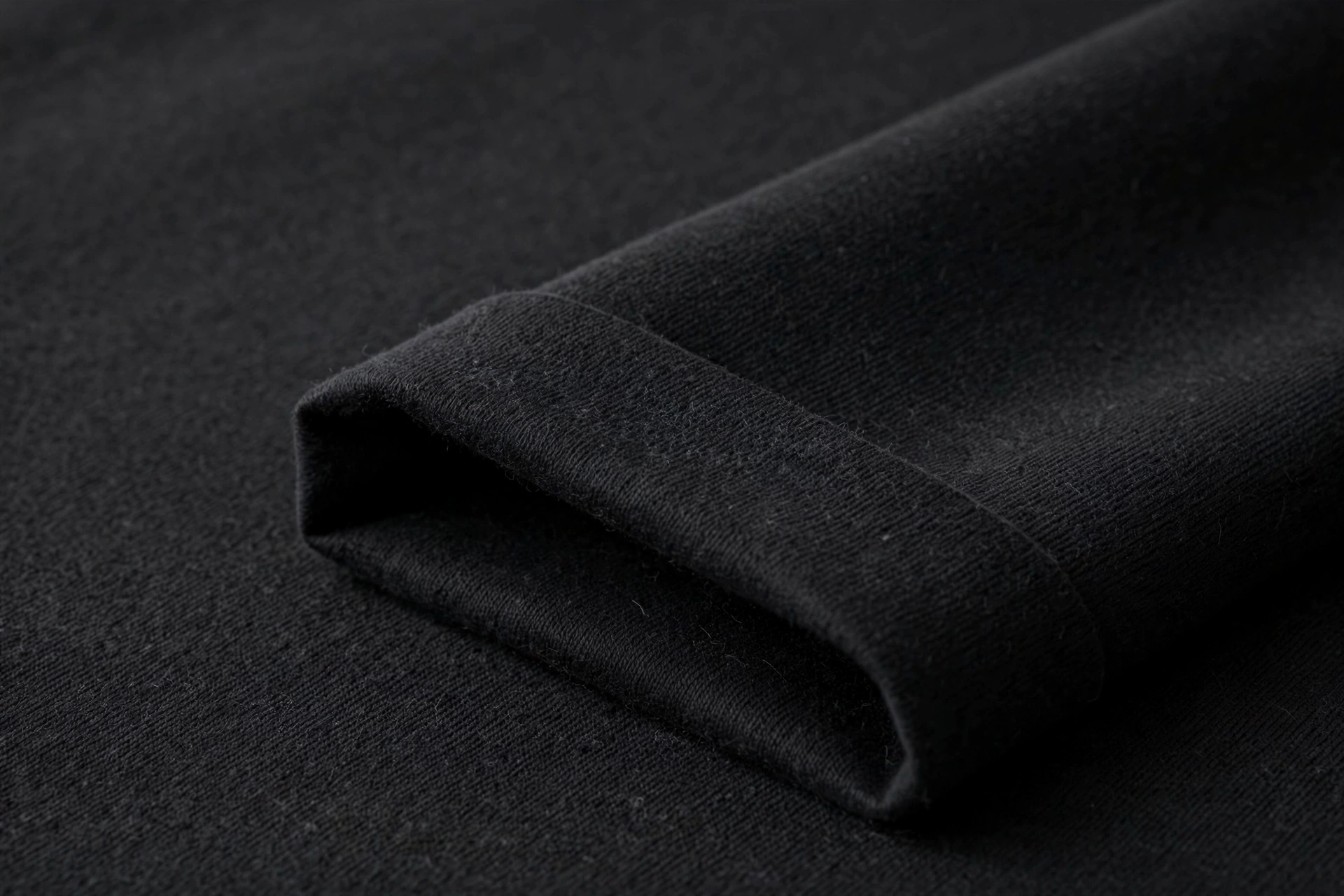 BLAKE ESSENCE Essential Tees — black heavyweight cotton fabric close-up